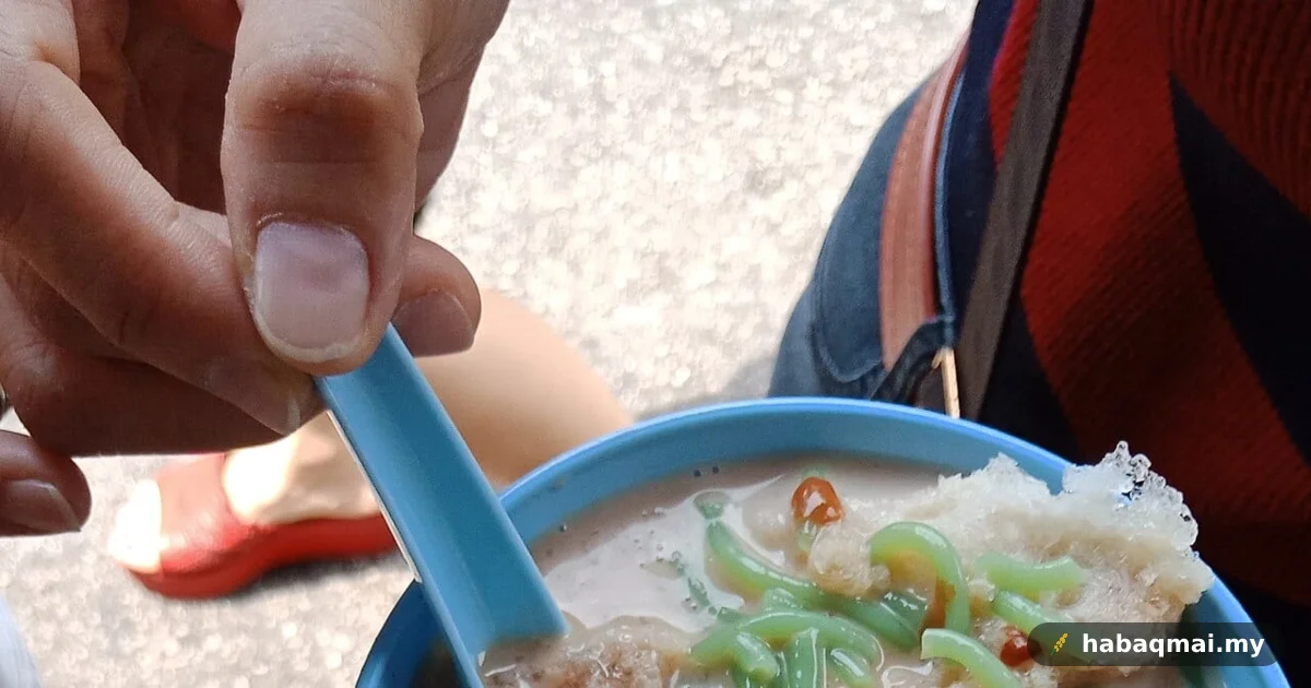 Ketupat Sotong: Sotong Sumbat Pulut Direbus Dalam Santan